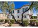 Charming two-story home featuring a stucco exterior, decorative shutters, and a tile roof at 4243 E Jasper Dr, Gilbert, AZ 85296