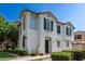 Charming two-story home featuring a stucco exterior, decorative shutters, and a tile roof at 4243 E Jasper Dr, Gilbert, AZ 85296