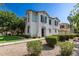 Charming two-story home featuring a stucco exterior, decorative shutters, and a tile roof at 4243 E Jasper Dr, Gilbert, AZ 85296