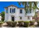 Charming two-story home featuring a stucco exterior, decorative shutters, and a tile roof at 4243 E Jasper Dr, Gilbert, AZ 85296