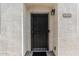 Close-up of front door with security screen at 4243 with a stucco exterior at 4243 E Jasper Dr, Gilbert, AZ 85296