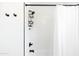 Shower with a white tile surround, modern fixtures, and a built-in shelf for toiletries at 4317 E Ludlow Dr, Phoenix, AZ 85032