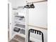 Organized closet with built-in shelving, hanging rods, and plenty of storage space at 4609 E Monte Cristo Ave, Phoenix, AZ 85032