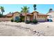 Charming single-story home with desert landscaping, tile roof, and an attached two-car garage at 4609 E Monte Cristo Ave, Phoenix, AZ 85032