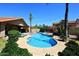 Stunning backyard pool surrounded by lush greenery and lounge chairs for a private oasis at 4609 E Monte Cristo Ave, Phoenix, AZ 85032