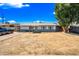 Charming single-story home with a well-maintained yard and a cozy, inviting front porch at 4828 N 71St Ave, Phoenix, AZ 85033
