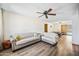 Spacious living room boasts with wood flooring and views into the dining area at 4828 N 71St Ave, Phoenix, AZ 85033