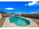 Backyard pool with easy access to the covered patio, creating a relaxing space for swimming and outdoor activities at 4828 N 71St Ave, Phoenix, AZ 85033
