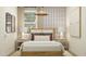 Stylish bedroom with designer wallpaper, a wood frame bed, and ample natural light at 4987 S 233Rd Dr, Buckeye, AZ 85326