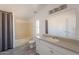 Bathroom featuring a shower/tub combo and a vanity with cabinet at 54073 W Stallion Rd, Maricopa, AZ 85139