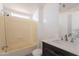 Bathroom featuring a shower/tub combo and a modern vanity at 54073 W Stallion Rd, Maricopa, AZ 85139