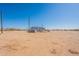 A one story home on a large lot with desert landscaping at 54073 W Stallion Rd, Maricopa, AZ 85139