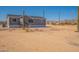 Charming single-story home featuring desert landscape and views of the surrounding mountains at 54073 W Stallion Rd, Maricopa, AZ 85139