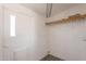 A well-lit utility room with shelving and storage at 54073 W Stallion Rd, Maricopa, AZ 85139