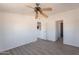 Living room with new floors and adjacent rooms at 54073 W Stallion Rd, Maricopa, AZ 85139