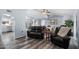 Cozy living room with comfortable seating and open access to the dining room and kitchen at 633 Leisure World --, Mesa, AZ 85206