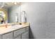 Bathroom featuring a single sink vanity and decorative lighting at 6348 N 7Th Ave # 6, Phoenix, AZ 85013