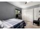 Inviting bedroom with a ceiling fan and ample closet space for storage at 6348 N 7Th Ave # 6, Phoenix, AZ 85013