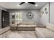 Spacious living room with sofa, wood floors, decorative accents, and a view of the entrance at 6348 N 7Th Ave # 6, Phoenix, AZ 85013