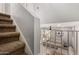 View from the stairs leading down to the well-lit living room at 6348 N 7Th Ave # 6, Phoenix, AZ 85013
