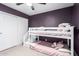 Bedroom with bunkbeds, ceiling fan, carpet, and window with privacy blinds or curtains at 6869 E Flossmoor Ave, Mesa, AZ 85208