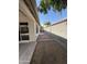 A narrow side yard featuring neutral colored stones at 7922 W Alex Ave, Peoria, AZ 85382