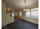 Dining area with tile floors and a view of the backyard at 7922 W Alex Ave, Peoria, AZ 85382