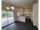 Open-concept kitchen with a view of the backyard at 7922 W Alex Ave, Peoria, AZ 85382