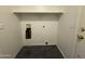 Unfinished laundry room area; requires some handyman attention and elbow grease at 7922 W Alex Ave, Peoria, AZ 85382