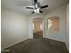 View of living room with carpet flooring at 7922 W Alex Ave, Peoria, AZ 85382