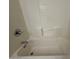 Close up of a shower tub with shower head and soap ledge at 7922 W Alex Ave, Peoria, AZ 85382
