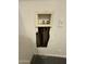 Exposed plumbing and electrical wiring needs repair and attention for safety concerns at 7922 W Alex Ave, Peoria, AZ 85382