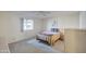 Comfortable bedroom with carpet floors, ceiling fan, and an open view of the yard at 7950 E Keats Ave # 175, Mesa, AZ 85209