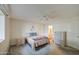 Spacious bedroom with carpet floors, a ceiling fan and lots of natural light at 7950 E Keats Ave # 175, Mesa, AZ 85209