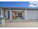 View of an open garage revealing ample storage space and a peek into the home at 7950 E Keats Ave # 175, Mesa, AZ 85209