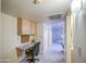 Office nook with tiled floor, built-in desk and lots of storage at 7950 E Keats Ave # 175, Mesa, AZ 85209