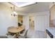 Eat-in kitchen with laminate countertops, casual dining, laundry and built-in desk at 7950 E Keats Ave # 175, Mesa, AZ 85209