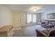 Comfortable living room featuring plush seating, ample lighting, and a welcoming ambiance at 7950 E Keats Ave # 175, Mesa, AZ 85209