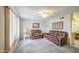 Inviting living room with plush seating, a ceiling fan, and ample natural light at 7950 E Keats Ave # 175, Mesa, AZ 85209