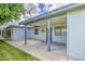 View of covered patio with blue steel support beams and a clean concrete floor at 7950 E Keats Ave # 175, Mesa, AZ 85209