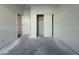 Empty bedroom featuring an open closet and neutral walls at 9536 W Parkway Dr, Tolleson, AZ 85353