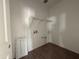 Functional laundry room with shelving for storage and hookups at 9536 W Parkway Dr, Tolleson, AZ 85353