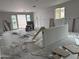 Open room under construction with drywall, sliding glass doors and a large window at 9536 W Parkway Dr, Tolleson, AZ 85353