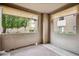 Private balcony features exterior shades, concrete flooring and outdoor rug at 9600 N 96 Th St # 130, Scottsdale, AZ 85258