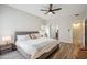 Inviting main bedroom showcasing a plush bed, natural light, and easy access to the ensuite bathroom at 9600 N 96 Th St # 130, Scottsdale, AZ 85258