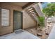 Exterior view of the home's front entrance, featuring a small landscaped area at 9600 N 96 Th St # 130, Scottsdale, AZ 85258