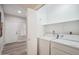 Convenient laundry area equipped with a washer and dryer, located inside the home at 9600 N 96 Th St # 130, Scottsdale, AZ 85258