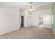 Main bedroom with high ceiling and view of the bathroom and closet at 975 E Lincolnwood Cir, Casa Grande, AZ 85194