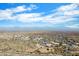 Panoramic aerial vista capturing a desert residential community nestled between hills and distant mountains at 0 N 128Th St, Scottsdale, AZ 85255