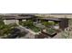 A lush backyard offers a serene retreat with lounge seating, grass, and mature desert landscaping at 0 N 128Th St, Scottsdale, AZ 85255